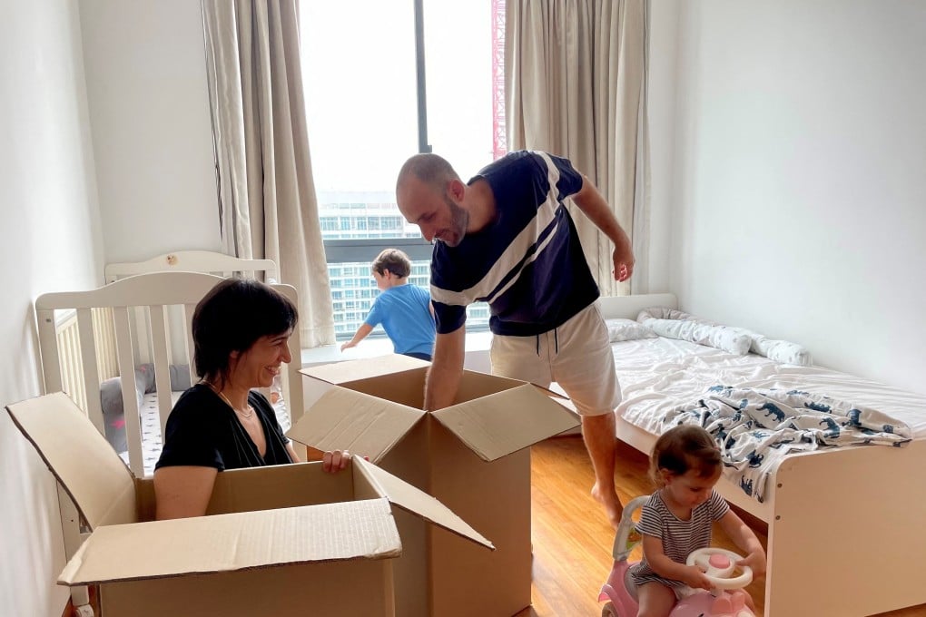 Israeli expatriate Atar Sandler packs up with her husband and children in their flat in Singapore for relocation to New York. Photo: Reuters