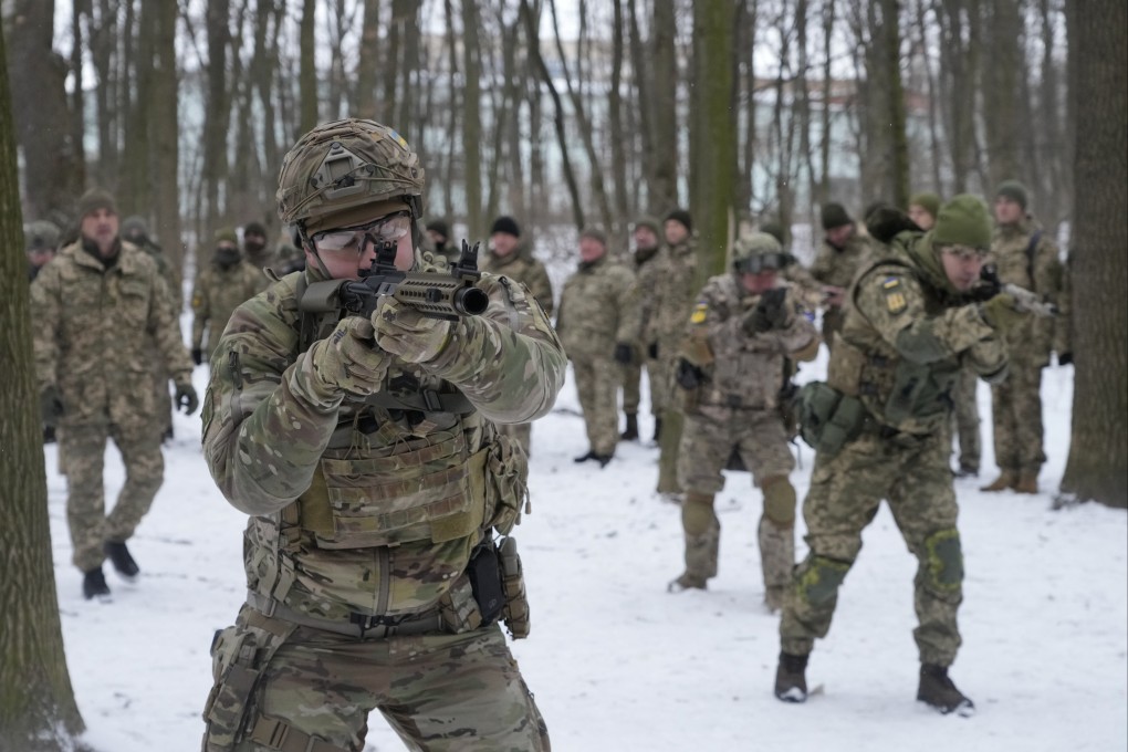 Members of Ukraine’s Territorial Defence Forces, volunteer military units of the Armed Forces, train in a city park in Kyiv, Ukraine, on January 22. Photo: AP