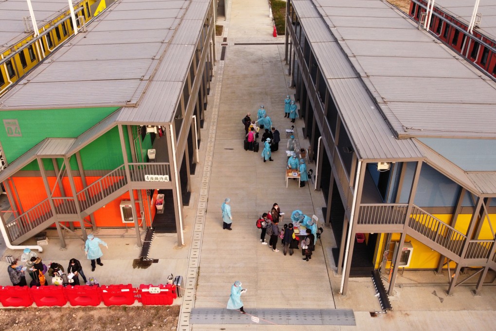 People arriving to start their isolation at the Penny’s Bay Quarantine Centre on Lantau Island. Photo: Martin Chan