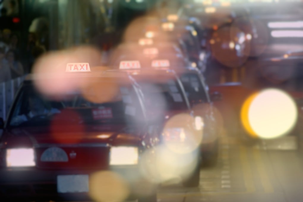 Taxis are seen on a road in Hong Kong. Photo: Shutterstock