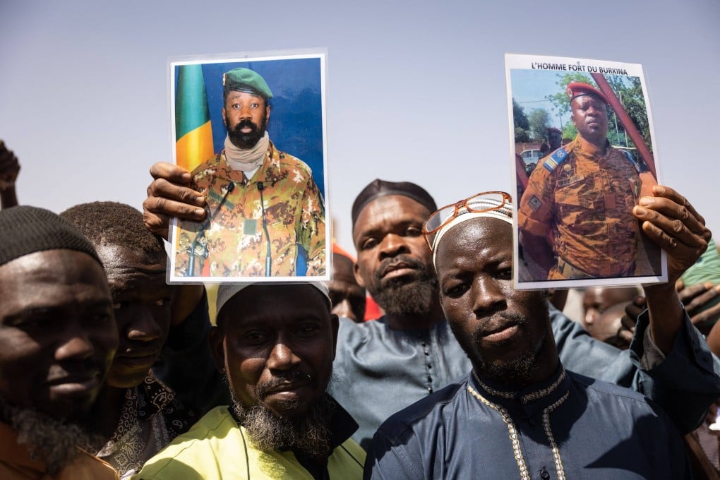 Protesters show support for the military in the Burkina Faso capital, Ouagadougou, on Tuesday, a day after the president was ousted. Photo: AFP