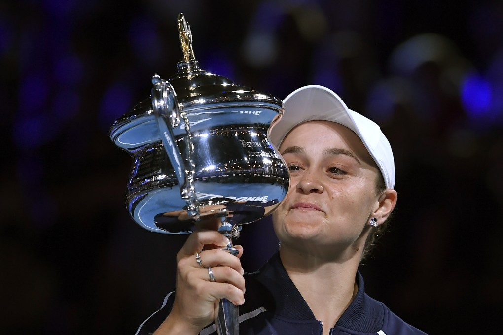 Ash Barty, of Australia, holds the Daphne Akhurst Memorial Cup aloft after defeating American Danielle Collins in the women’s singles final at the Australian Open in Melbourne. Photo: AP