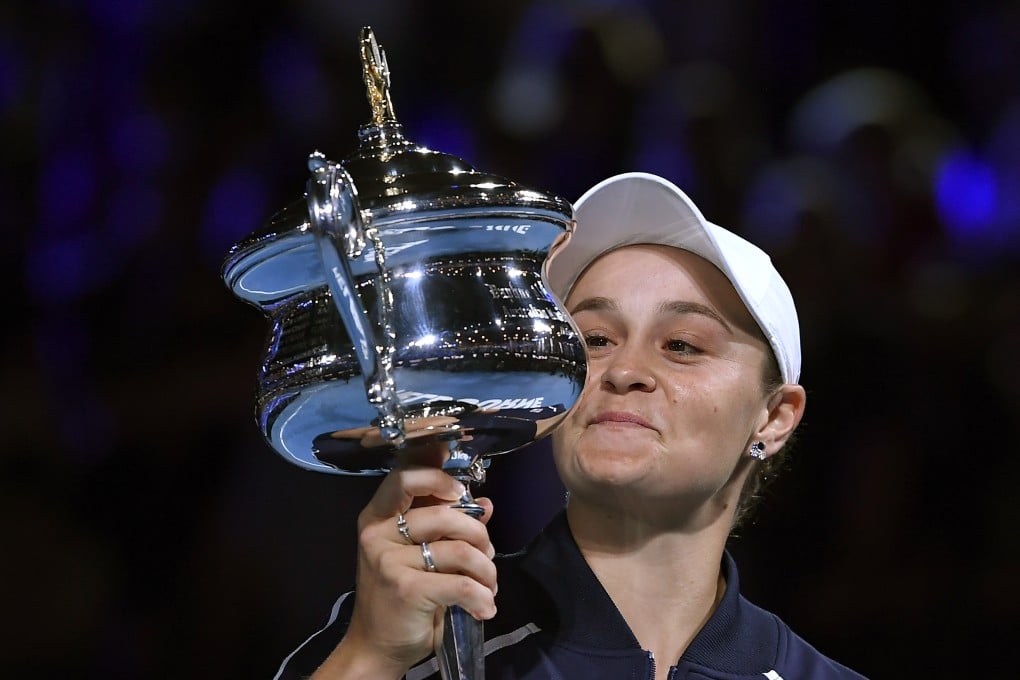 Ash Barty, of Australia, holds the Daphne Akhurst Memorial Cup aloft after defeating American Danielle Collins in the women’s singles final at the Australian Open in Melbourne. Photo: AP