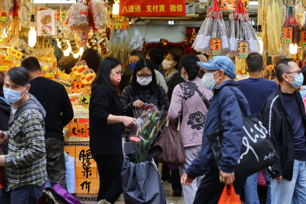 Residents shop at a wet market in Tsuen Wan on Saturday in preparation for the coming Lunar New Year. Photo: Dickson Lee