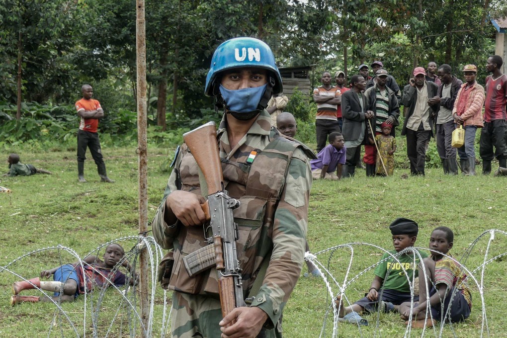 A UN peacekeeper holds his weapon during a patrol in Rugari, near the city of Goma, in eastern Democratic Republic of Congo on January 28. Photo: AFP