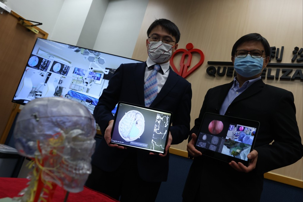 Dr Calvin Mak Hoi-kwan (left), consulting neurosurgeon at Queen Elizabeth Hospital, and Kowloon Central Cluster Information Technology Department Systems Manager Wallace Cheng brief the media on the hospital’s technological upgrade. Photo: Nora Tam