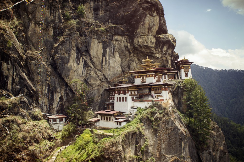 The Bhutan Paro Valley Tigers Nest Monastery Mountain Cliff on the Trans Bhutan Trial. Photo: G-Adventures