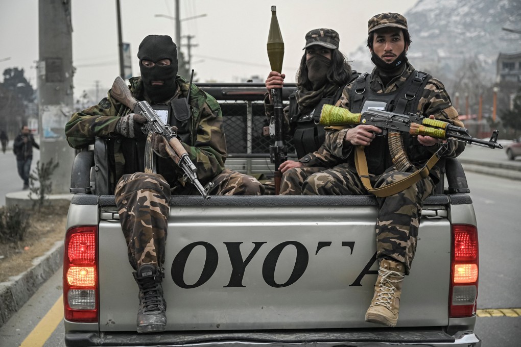 Taliban fighters patrol along a street in Kabul earlier this month. The UN says more than 100 former Afghan government and security employees have been killed since the Taliban takeover last year. Photo: Mohd Rasfan/AFP/Getty Images/TNS