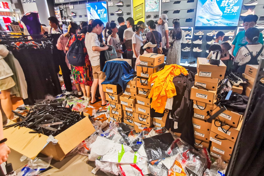Customers in a store of ERKE, a Chinese sportswear brand, in Qingdao. Attitudes towards fashion consumption are shifting and, experts say, Chinese Gen Z shoppers might be the ones that lead the way. Photo: Getty Images