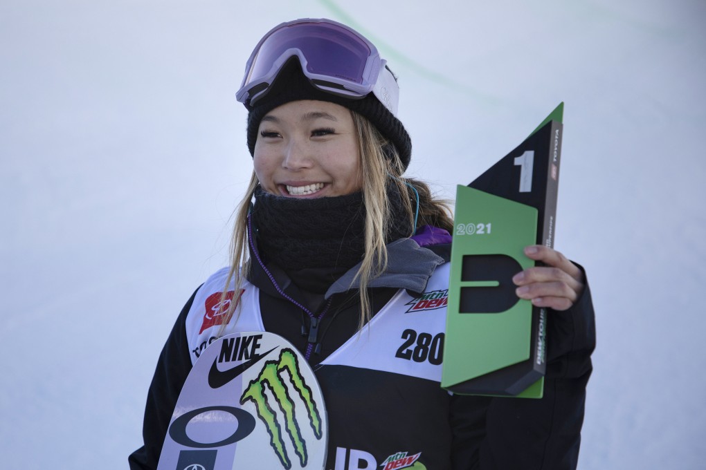 Chloe Kim celebrates on the podium after winning the Dew Tour snowboarding halfpipe final on December 19, 2021, in Colorado. Photo: AP