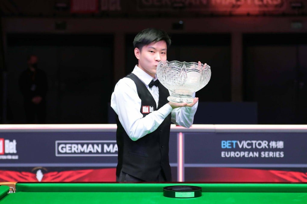 Zhao Xintong with the Brandon Parker Trophy after winning the German Masters in Berlin. Photo: World Snooker Tour