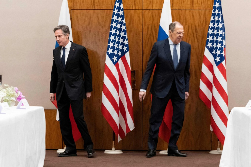 US Secretary of State Antony Blinken and Russian Foreign Minister Sergey Lavrov walk towards their seats before their meeting on Ukraine on January 21 in Geneva, Switzerland. Photo: AFP