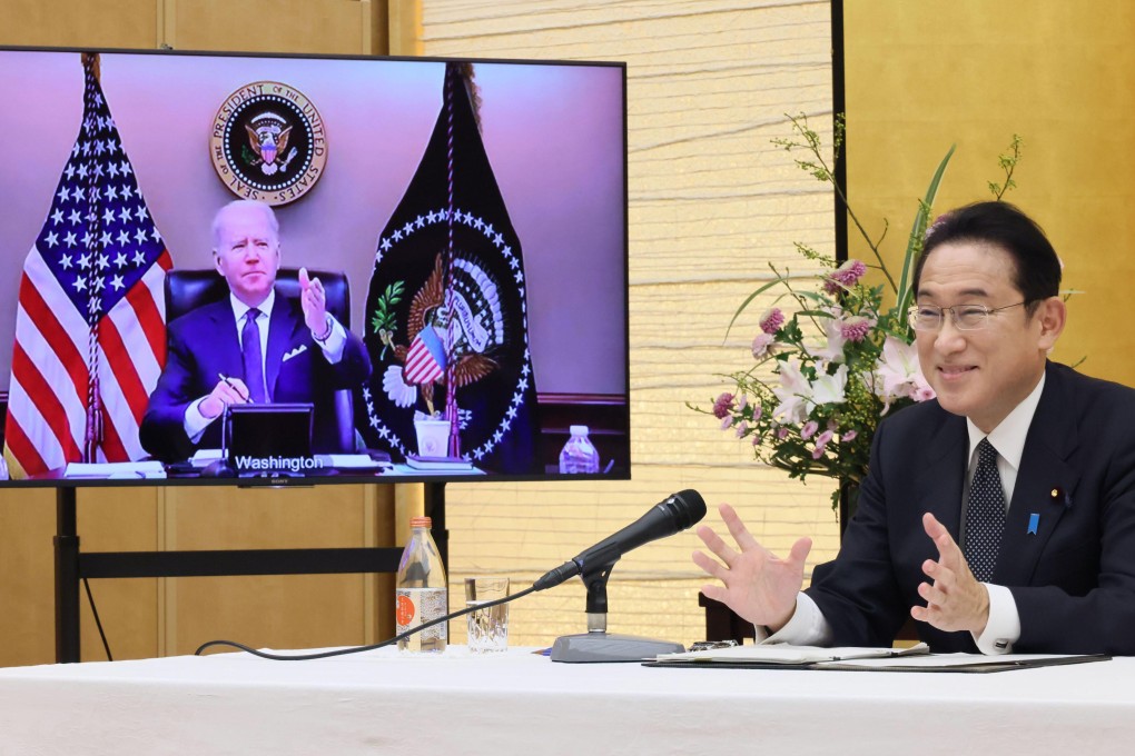 Japanese Prime Minister Fumio Kishida (right) at a virtual meeting with US President Joe Biden on January 21. Photo: Cabinet Secretariat/Kyodo News via AP