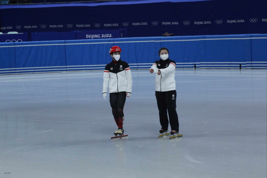 Hong Kong speed skater Sidney Chu and coach Sun Dandan seen here during a practice session in Beijing wearing tracksuits supplied by Fila. Photo: FILA