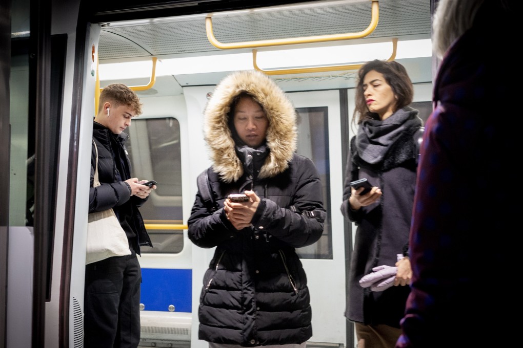 Passengers at a train station in Copenhagen. It is no longer mandatory to wear face masks anywhere in public in Denmark. Photo: EPA