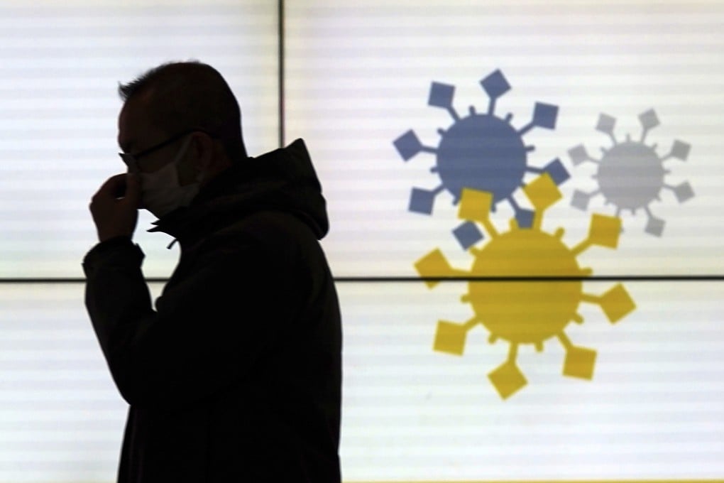 A man wearing a protective mask in Tokyo, Japan. Photo: AP