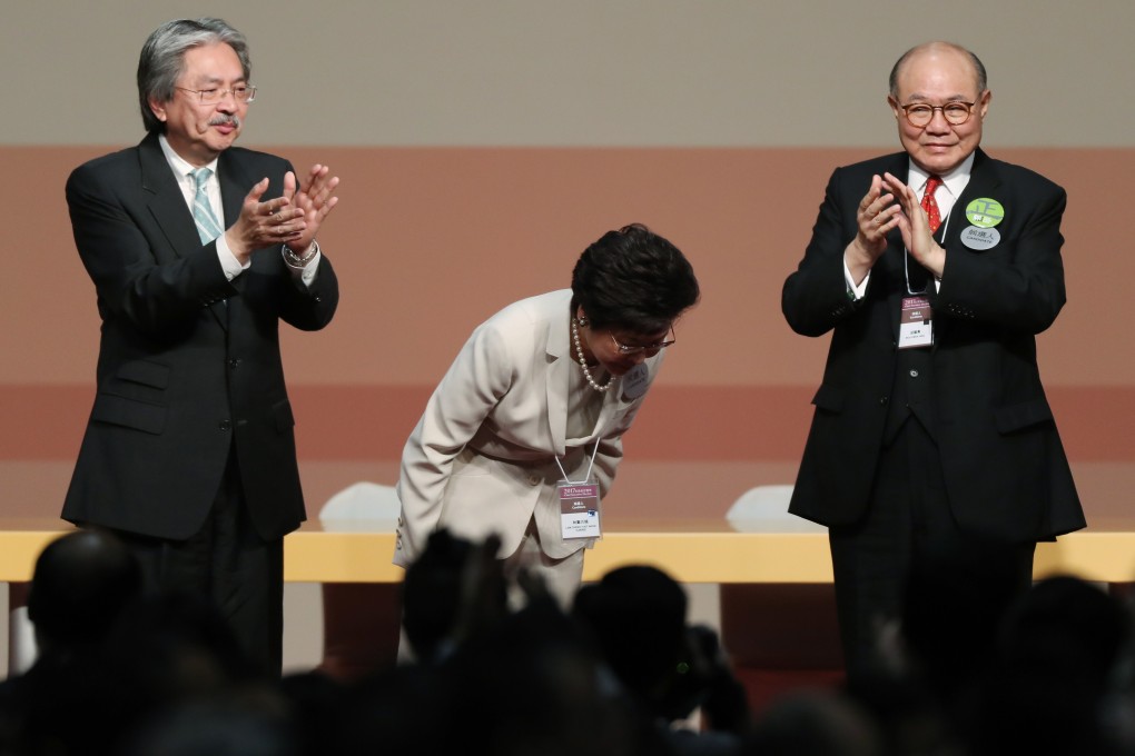 Chief Executive Carrie Lam bows after besting rivals John Tsang (left) and Woo Kwok-hing (right) in the 2017 leadership race. Photo: Robert Ng