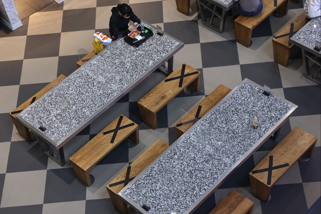 Social-distancing rules are enforced at a restaurant in Mong Kok. Photo: K. Y. Cheng