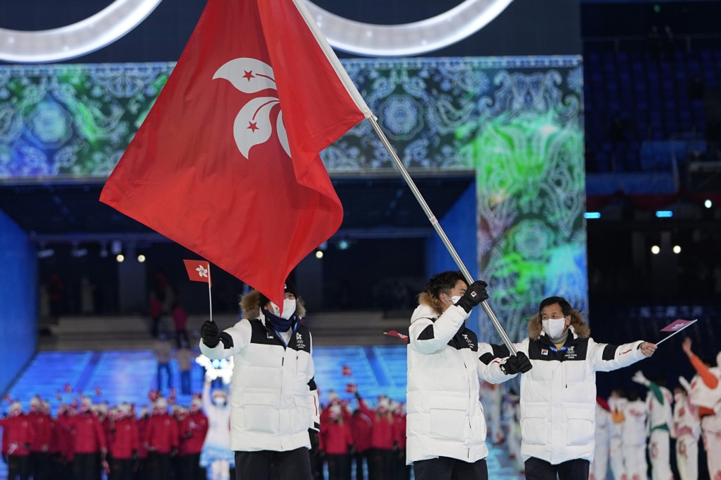 Sidney Chu, of Hong Kong, carries the city’s flag into the National Stadium during the opening ceremony of the 2022 Winter Olympics in Beijing. Photo: AP/Jae C Hong