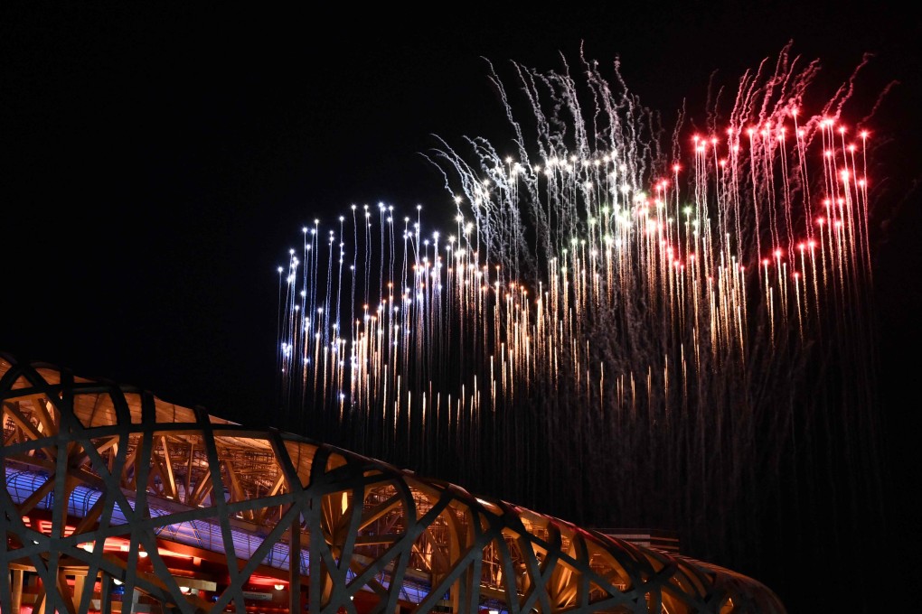Fireworks in the shape of the Olympic rings light up the sky above the National Stadium at the end of the opening ceremony of the Beijing 2022 Winter Olympic Games in Beijing. Photo: AFP