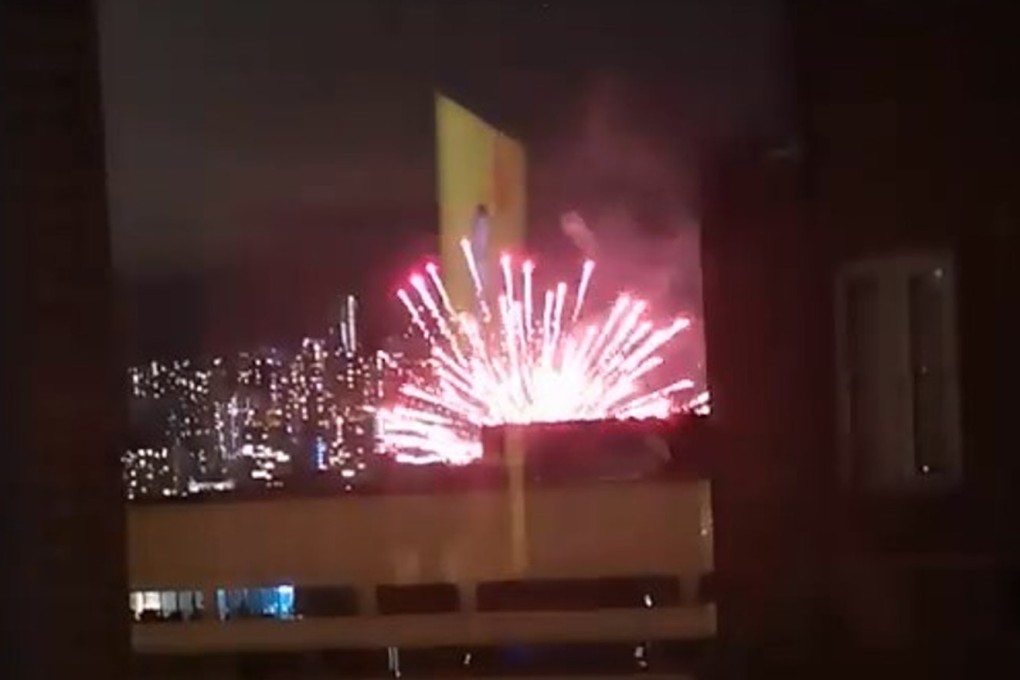 A screenshot from footage of illegal fireworks being set off in Tsim Sha Tsui. Photo: Facebook.