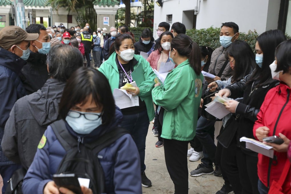 Residents line up for Covid-19 jabs at at a vaccination centre in Hong Kong on Saturday. Photo: Xiaomei Chen
