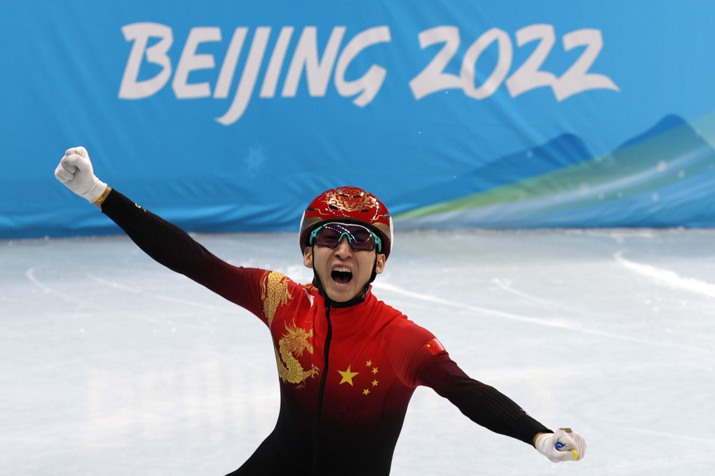 Dajing Wu celebrates winning the mixed team relay final. Photo: EPA-EFE