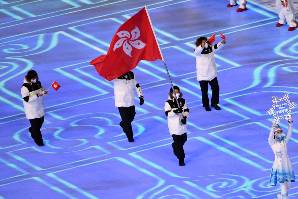 Hong Kong flag-bearer Sidney Chu with national team representatives at the 2022 Beijing Olympic Games opening ceremony. Photo: Reuters