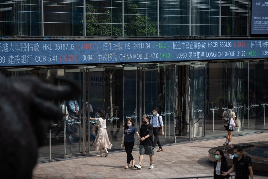 Pedestrians walk past the Exchange Square in Central, Hong Kong in September 2021. Photo: EPA-EFE