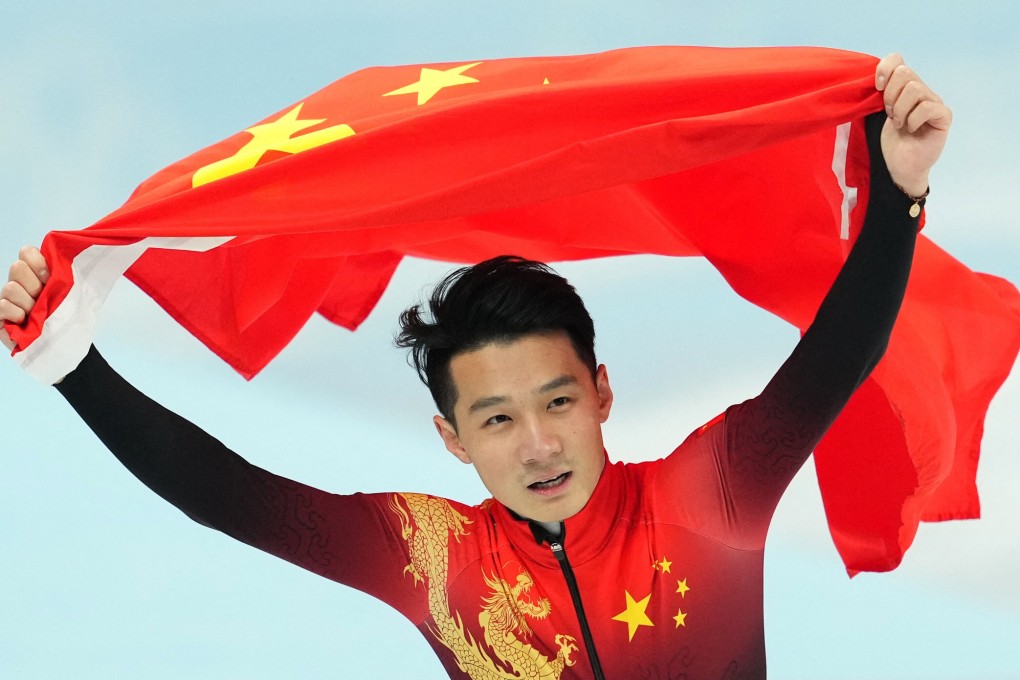 China’s Ren Ziwei celebrates after winning gold in the men’s 1,000m short-track speedskating. Photo: Reuters