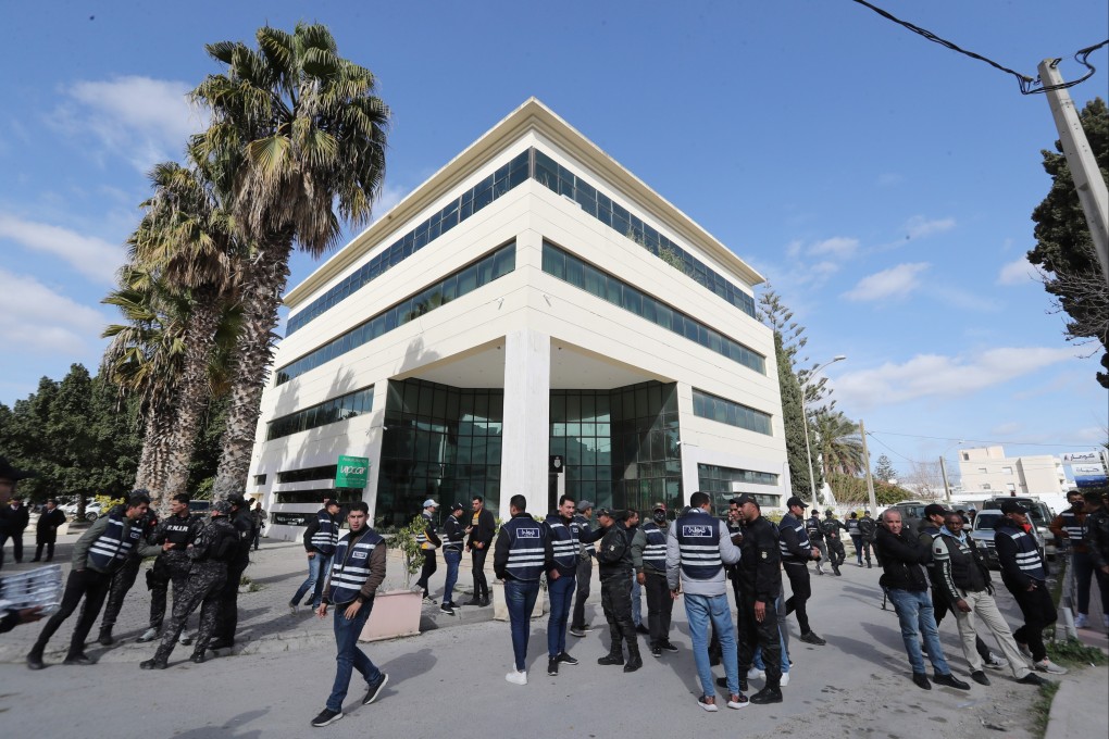 Members of the Tunisian security forces stand outside the closed headquarters of Tunisia’s Supreme Judicial Council in Tunis, Tunisia, on February 6. Photo: EPA-EFE