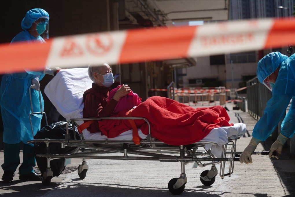 Medical workers evacuate the Salvation Army Lung Hang Residence for Senior Citizens in Tai Wai amid a Covid outbreak on July 24, 2020. Photo: Sam Tsang