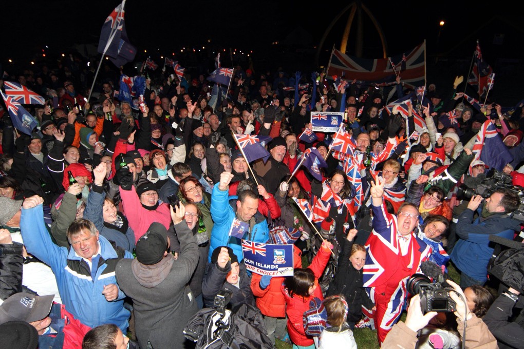 Falkland Islanders celebrate the result of a referendum in 2013, which overwhelmingly supported remaining British, despite Argentina’s sovereignty claims. Photo: AFP