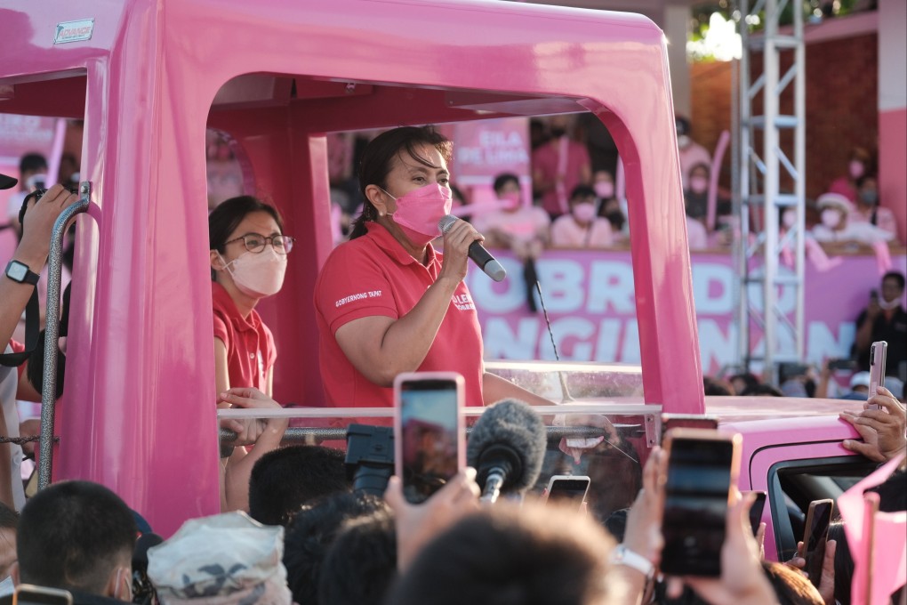Incumbent Vice-President and presidential hopeful Leni Robredo addresses supporters during a campaign rally in the Philippines on Tuesday. Campaigning in the presidential election has officially begun with a cast of candidates led by a late dictator’s son and the pro-democracy current vice president. Photo: AP
