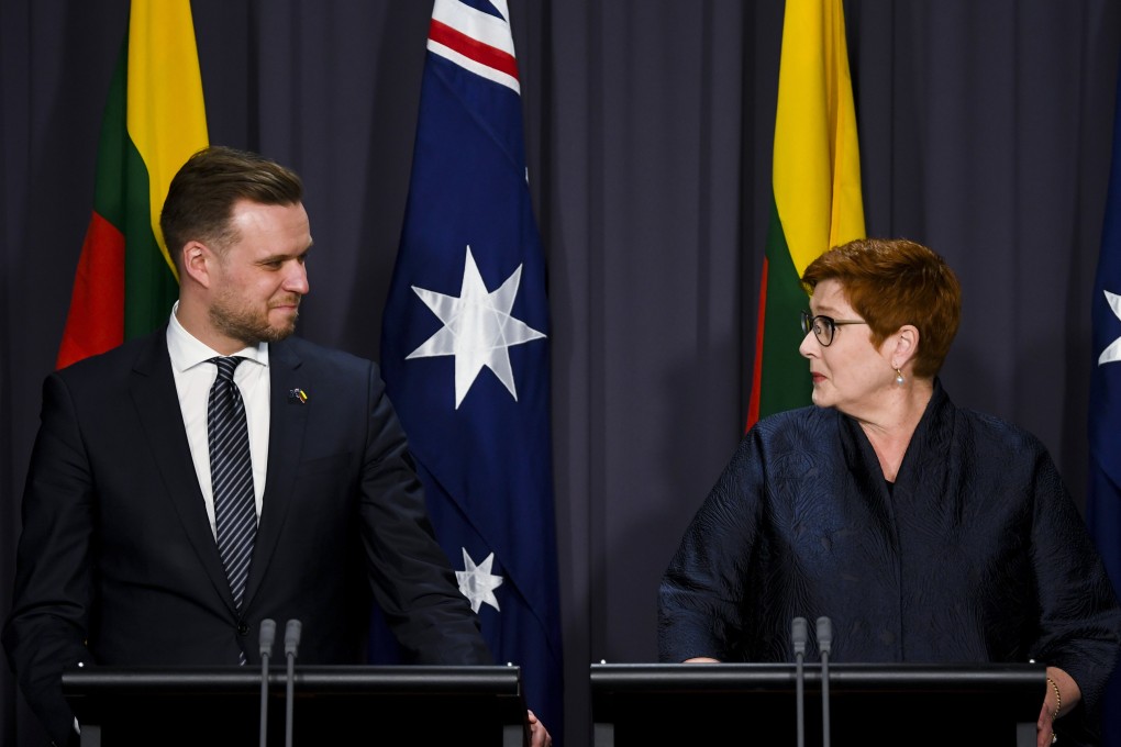Lithuania’s Foreign Minister Gabrielius Landsbergis and his Australian counterpart Marise Payne hold a press conference at Parliament House in Canberra on Wednesday. Photo: Lukas Coch/AAP Image via AP