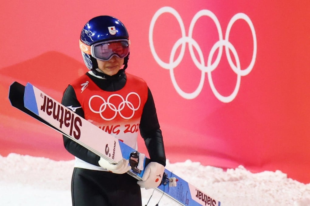 Sara Takanashi of Japan reacts during the ski jump mixed team final round at the Beijing 2022 Olympic Games. Photo: Reuters/Hannah Mckay