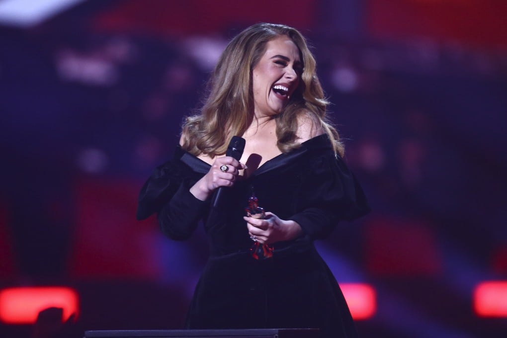 Adele accepts the award for album of the year at the first non-binary Brit Awards. Photo: Joel C Ryan/Invision/AP