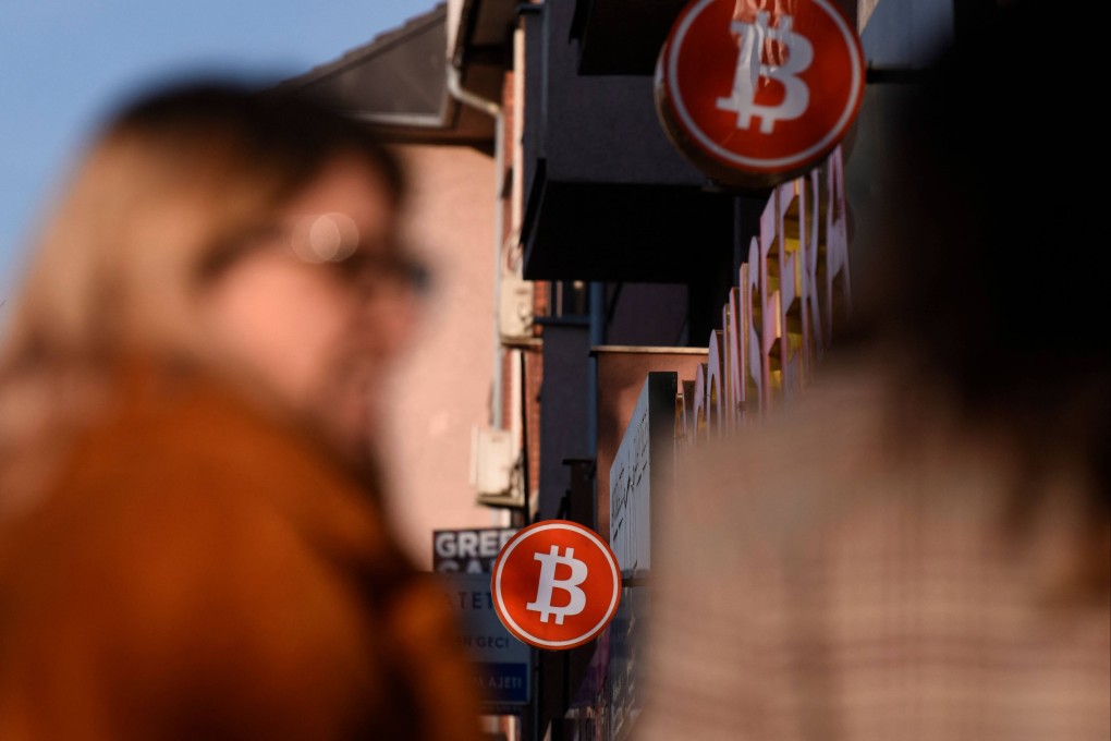 Bitcoin symbols displayed at an exchange bureau in Pristina, Kosovo, where cryptocurrency mining has been temporarily banned due to the activity’s serious drain on energy. Photo: AFP