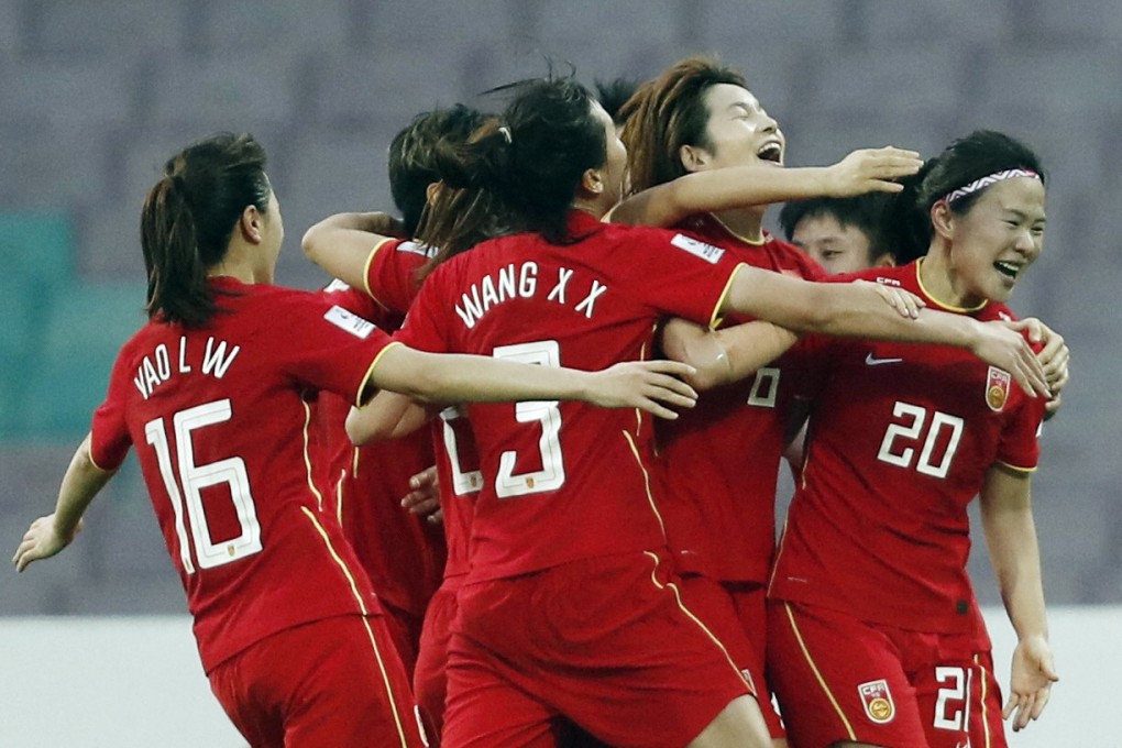 The Chinese side celebrates its comeback win over South Korea in the Women’s Asian Cup 2022. Photo: Reuters