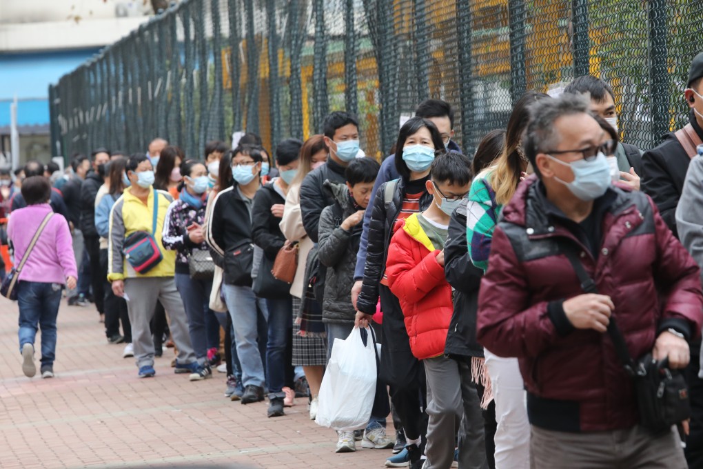 Local residents and workers subject to a mandatory testing order queue up for Covid-19 screening in Yuen Long on Thursday. Photo: Jelly Tse