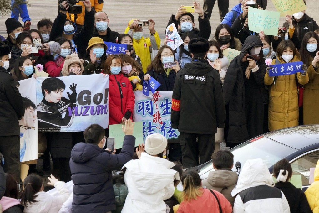 Fans of Japanese figure skater Yuzuru Hanyu gather in front of the Capital Indoor Stadium in Beijing. Photo: Kyodo