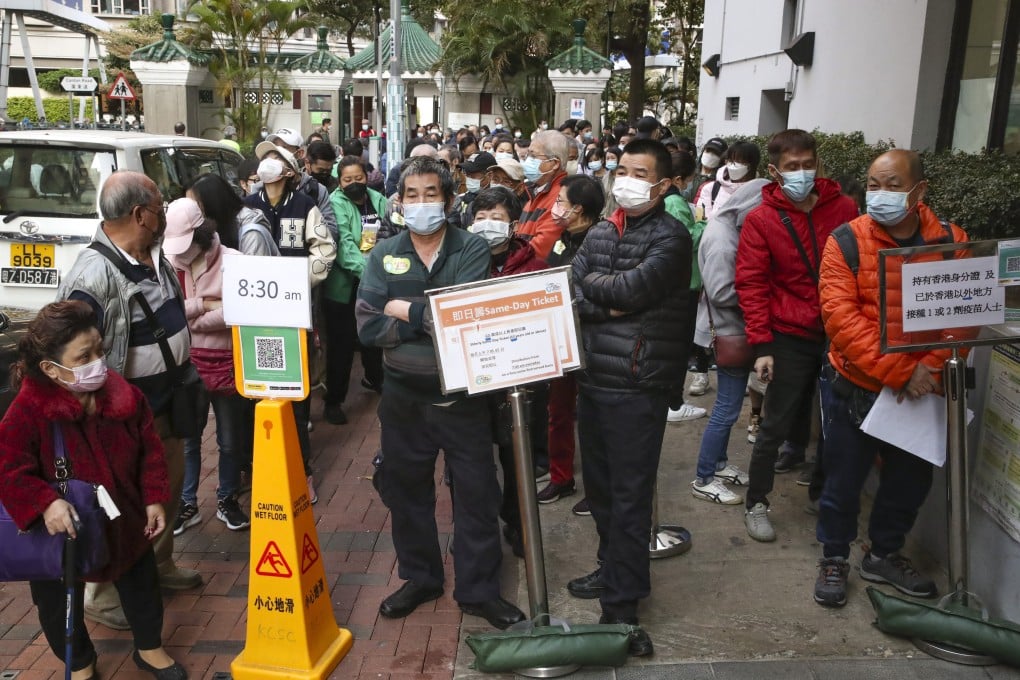 People queue up to receive the Sinovac coronavirus vaccine at the Kwun Chung Municipal Services Building on Friday morning. Photo: Edmond So