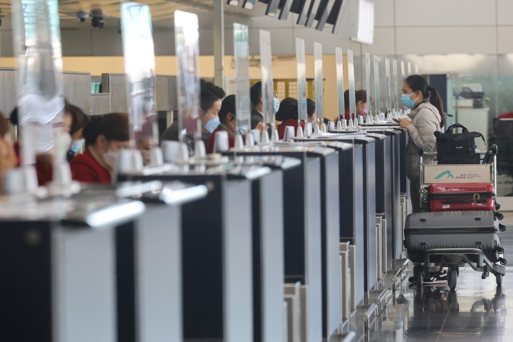 A passenger at Hong Kong International Airport on January 16, after many flights were cancelled. A flight ban for eight countries first imposed on January 6 will now remain in place until February 18. Photo: Dickson Lee