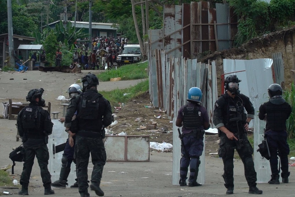 Australian police officers patrol the streets in riot-hit Honiara, Solomon Islands. File photo: AFP