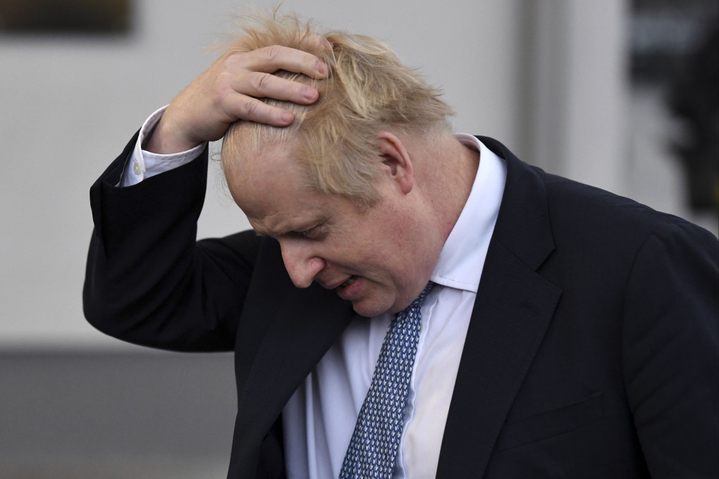 Britain’s Minister Boris Johnson at the Warszawska Brygada Pancerna military base near Warsaw, Poland on February 10. Photo: Daniel Leal / Pool via AP