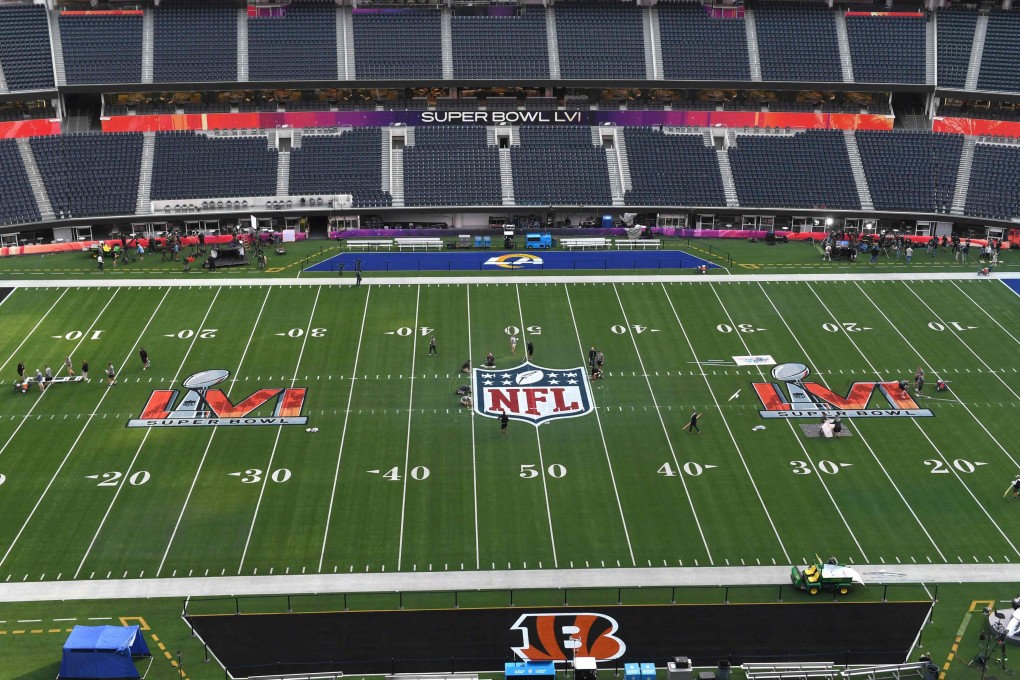 Workers prepare the field one day before Super Bowl LVI between the Los Angeles Rams and the Cincinatti Bengals at So-Fi Stadium in Inglewood, California. Photo: AFP
