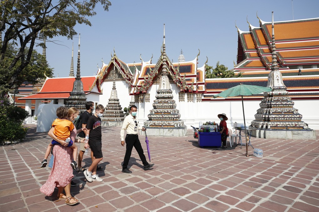 Tourists at Wat Pho in Bangkok. Thailand began allowing in fully and partially vaccinated foreigners from February 1. Photo: EPA-EFE