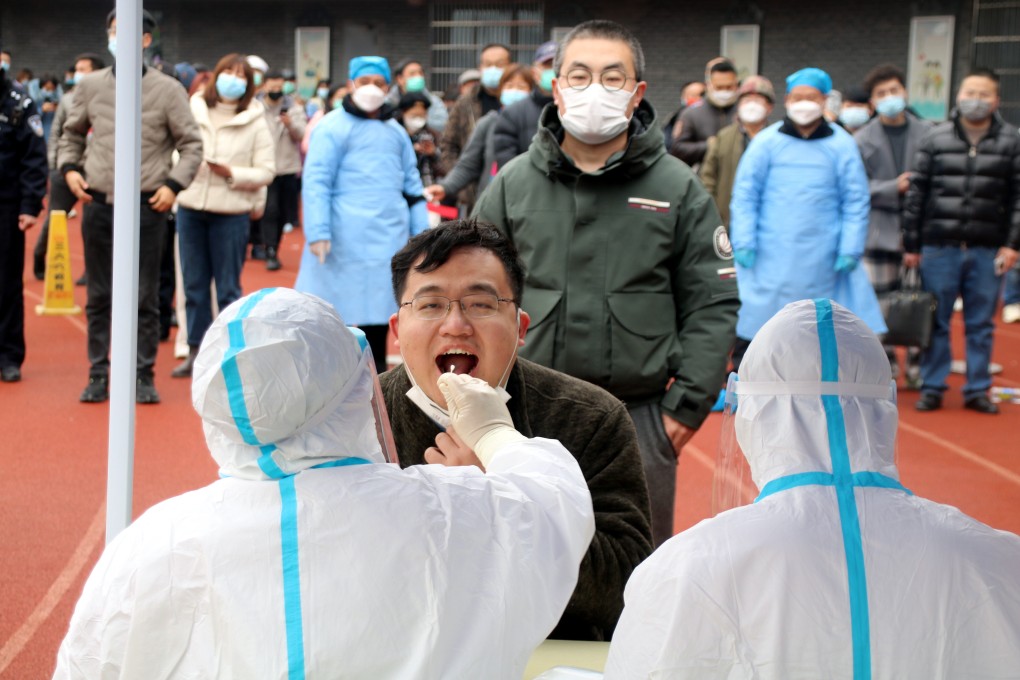 Residents take part in mass screening for the coronavirus in Suzhou on Monday. Photo: Costfoto/Future Publishing via Getty Images