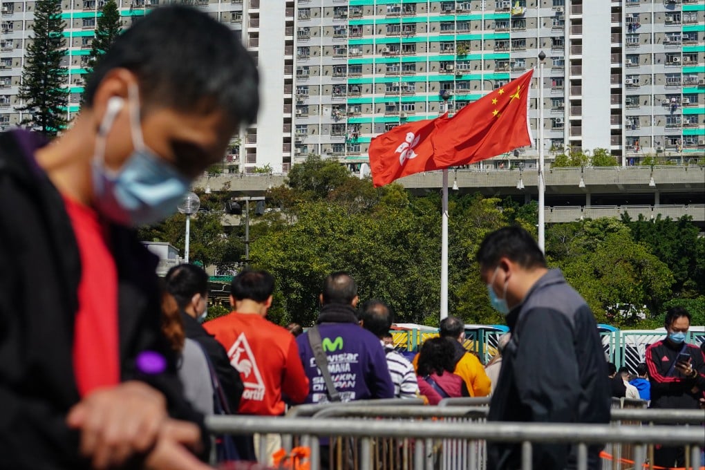 Residents wait for Covid-19 testing at a mobile screening point in Wong Tai Sin. Photo: Felix Wong