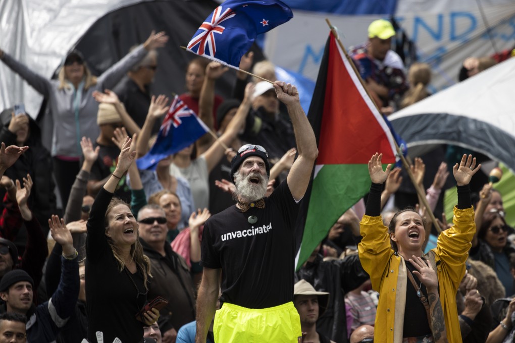 People opposing vaccine mandates protest in Wellington on February 14, 2022. Photo: NZ Herald via AP